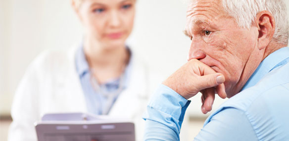 Elderly man with distressed look at doctor's office