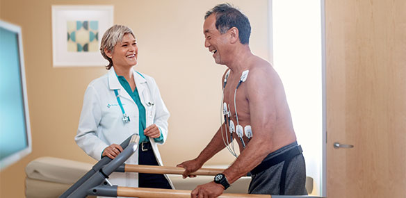 Sutter doctor with patient on treadmill