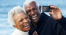 Senior couple taking selfie