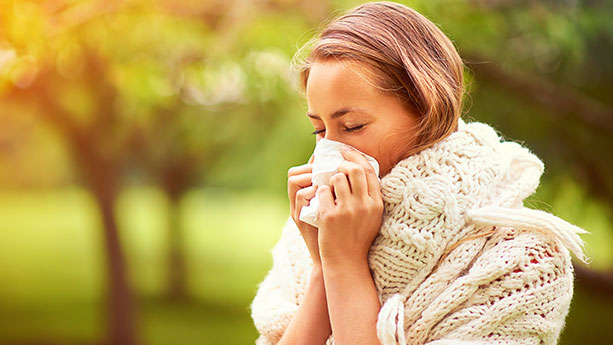 Woman with allergies outside