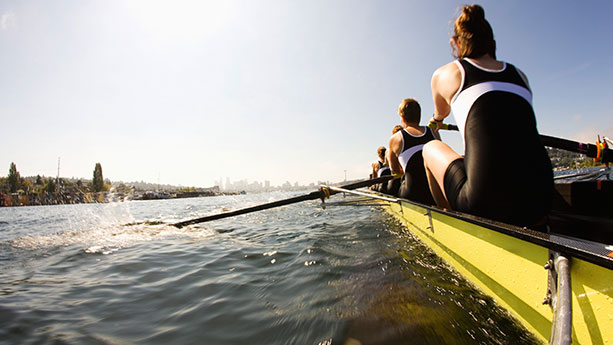 Women rowing on boat