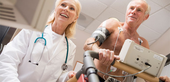Elderly white male participating in a heart treadmill stress test