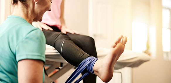 Young woman getting physical therapy