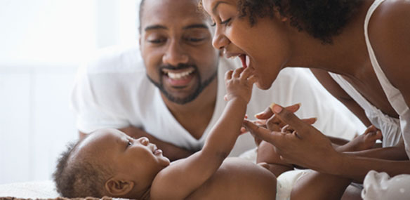 African-American family with new baby