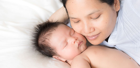 Asian Mom with newborn baby