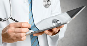  Doctor with digital tablet