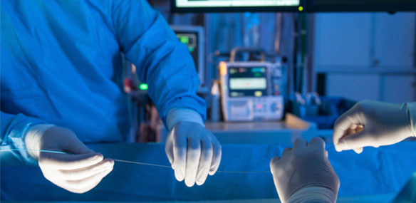 Doctors performing heart stent surgery