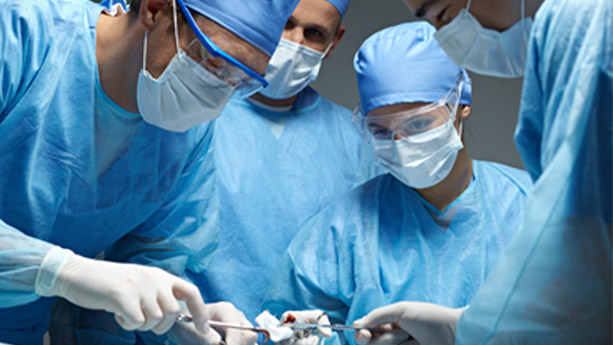 Surgeons at work in operating room