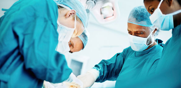 Team of surgeons operating
