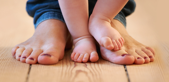 Mother and baby feet