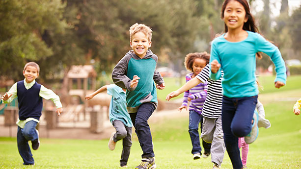 Kids running in park