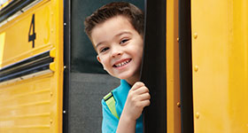 Little boy on school bus