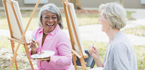 Senior women taking an art class