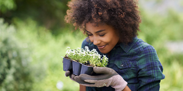 African-American woman gardening